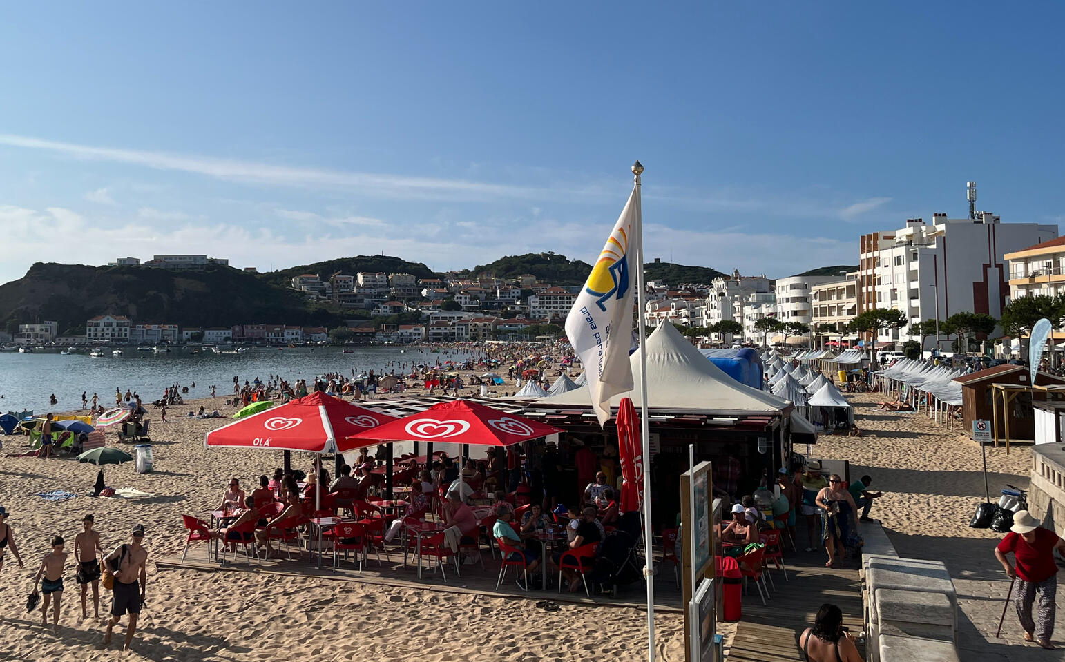 Beach café with red umbrellas in São Martinho do Porto Beach café with red umbrellas in São Martinho do Porto