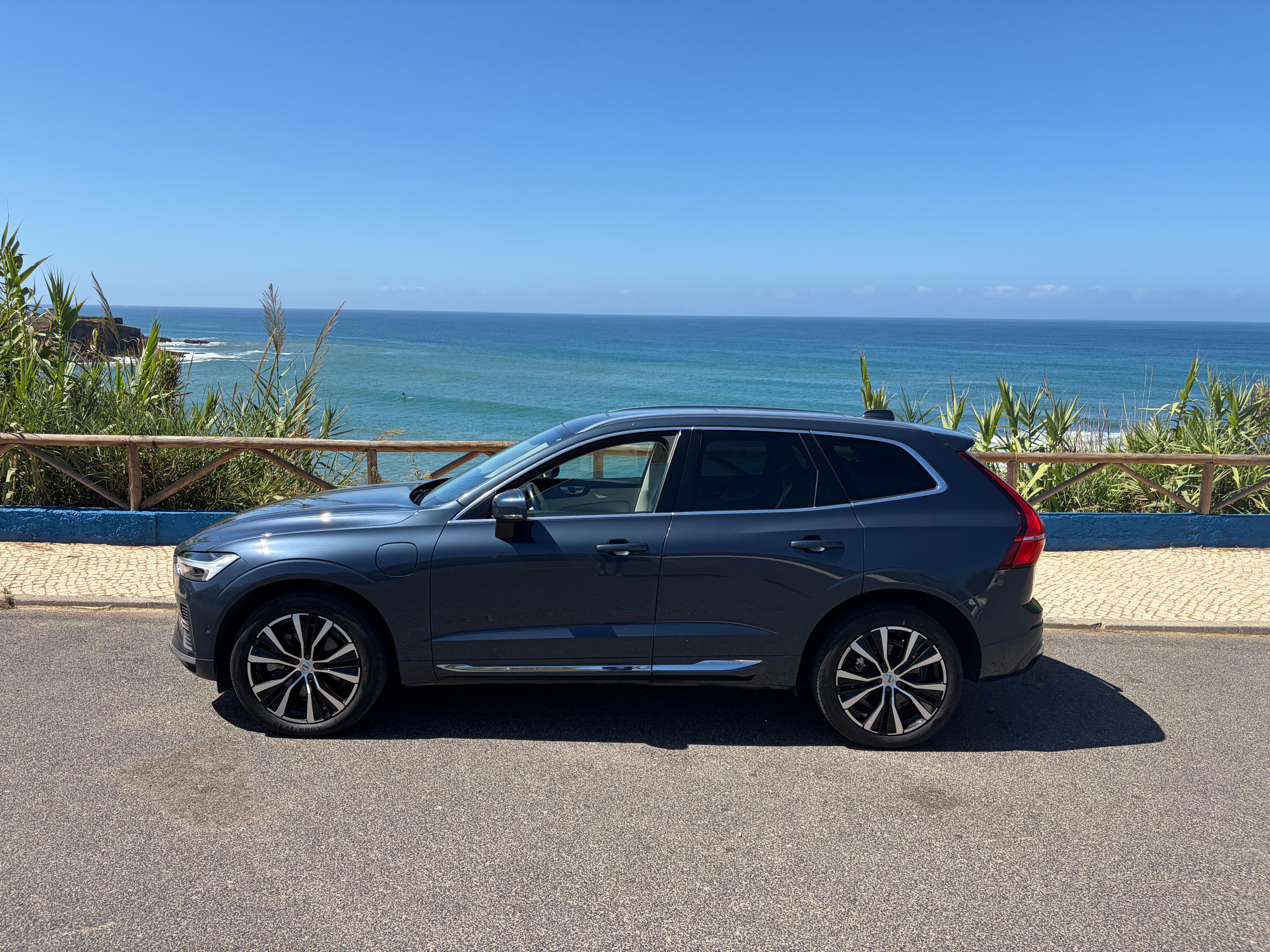 Portugal Revealed's Volvo XC60 tour vehicle at a coastal viewpoint near Ericeira